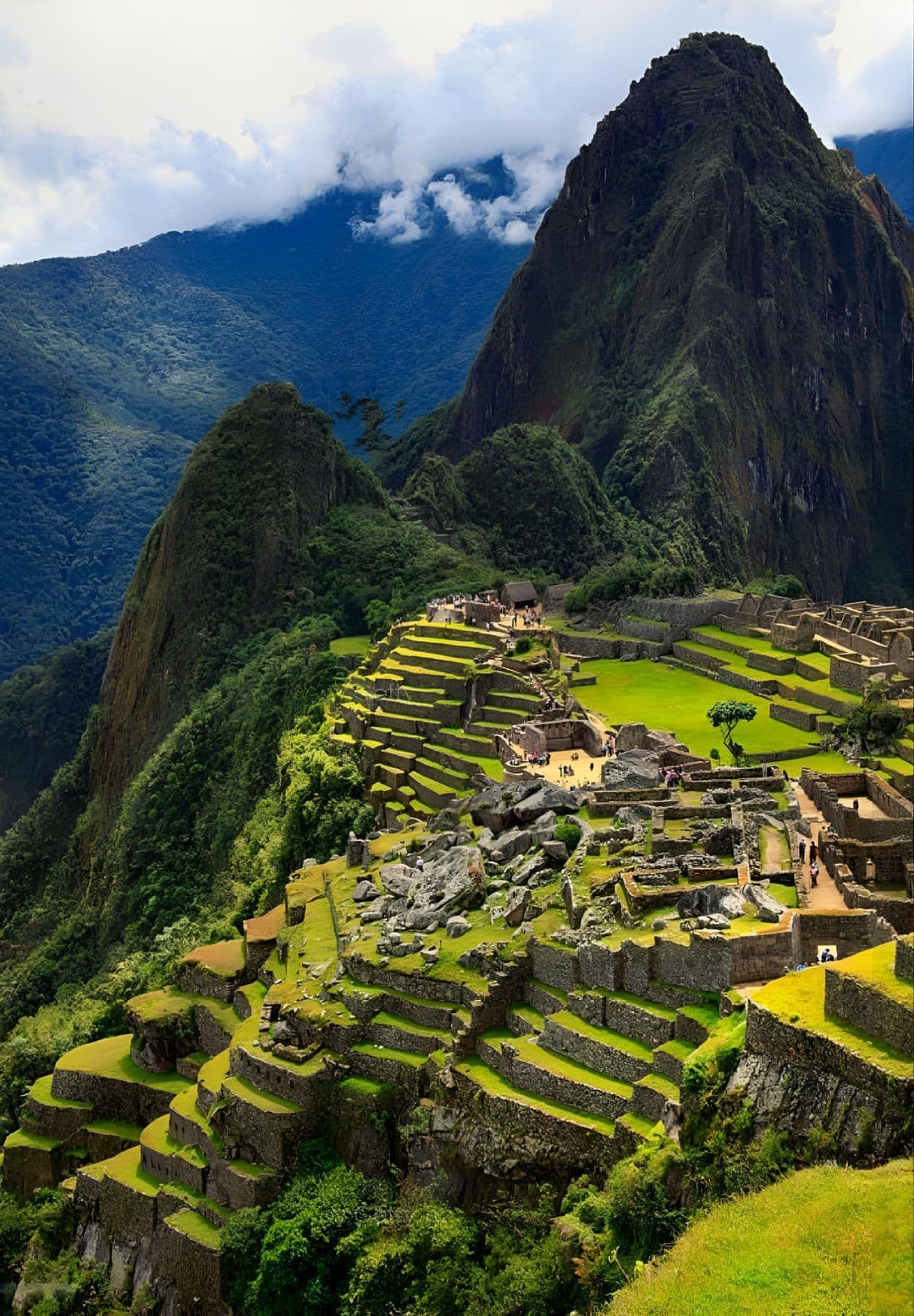 Soaring above the ancient ruins, an enchanting aerial view unveils the majesty and timeless beauty of Machu Picchu, inviting admiration and fascination.