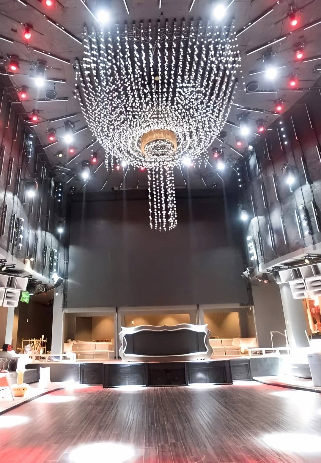 Suspended within the dancing space, the chandelier transforms into a beautiful centerpiece, with each twirl and movement becoming an illuminated celebration.