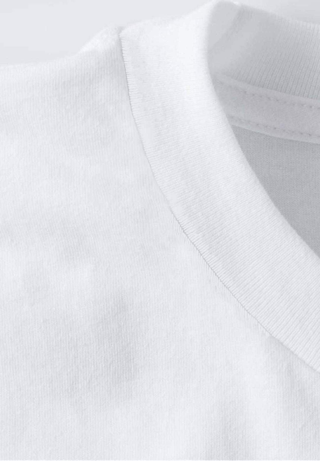 Threads of the white collar, in close-up, tell stories of subtle elegance and timeless, enduring resilience with quiet strength
