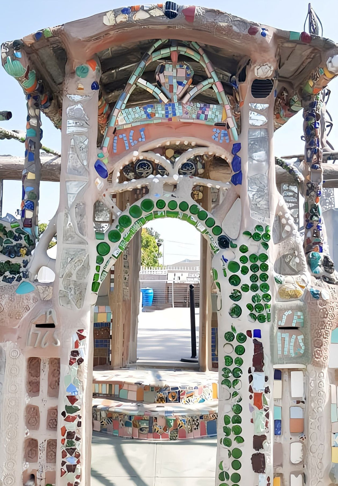 The entrance of Watts Tower commemorates the vibrant life and rich heritage of the neighborhood.