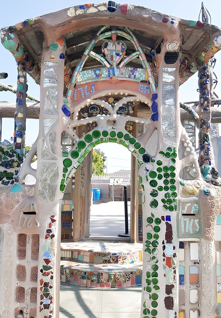The entrance of Watts Tower commemorates the vibrant life and rich heritage of the neighborhood.