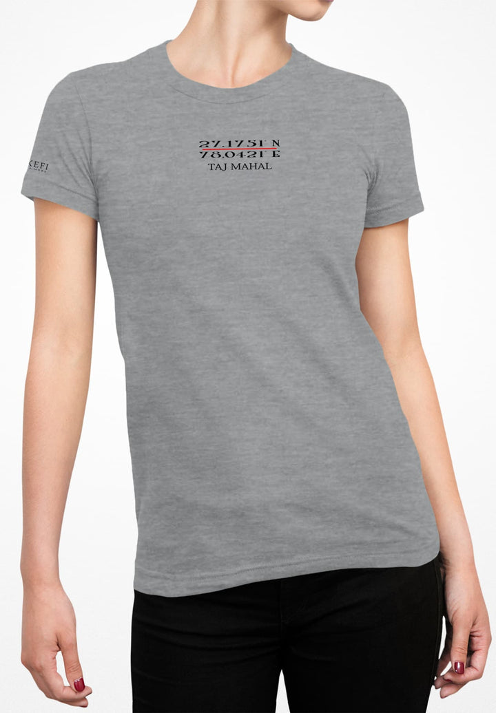 In a gray T-shirt and black jeans, she captures casual style and sophistication.