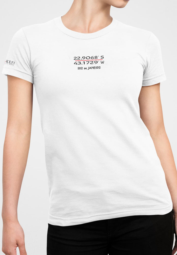 She stands in a white logo T-shirt and black jeans, a canvas of simplicity with the subtle artistry of everyday elegance.