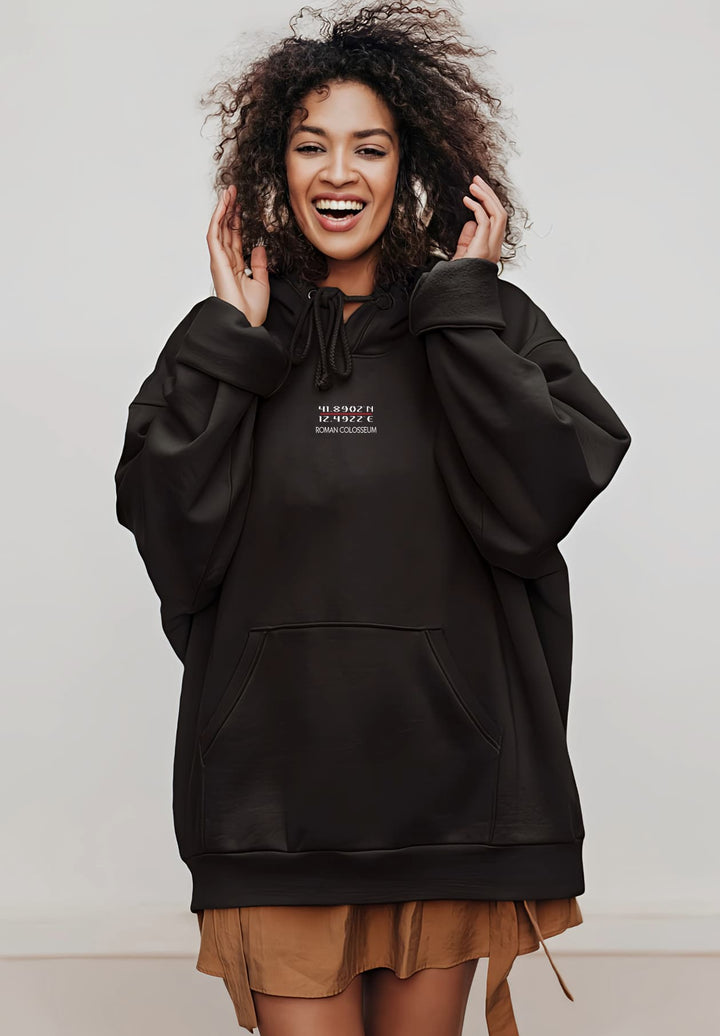 Our black hoodie, worn by this happy-looking woman, is a statement that happiness and style can seamlessly coexist. 