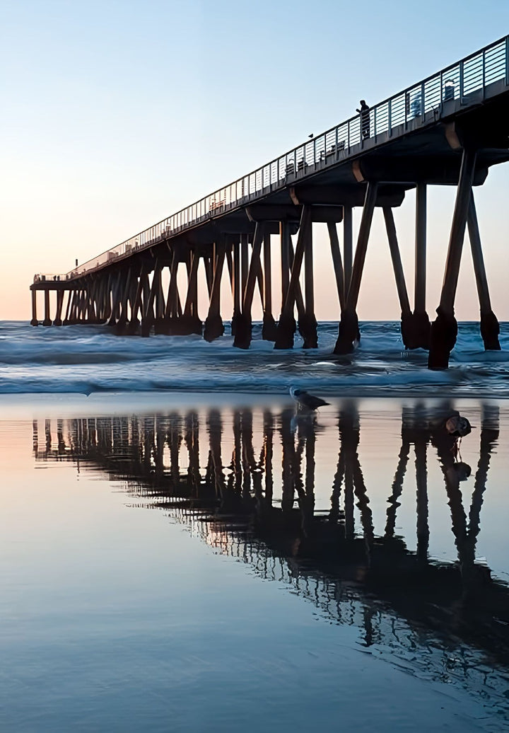 The essence of seaside delight, echoing laughter, salt-kissed breezes, and carefree moments is woven into coastal memories by Hermosa Pier.