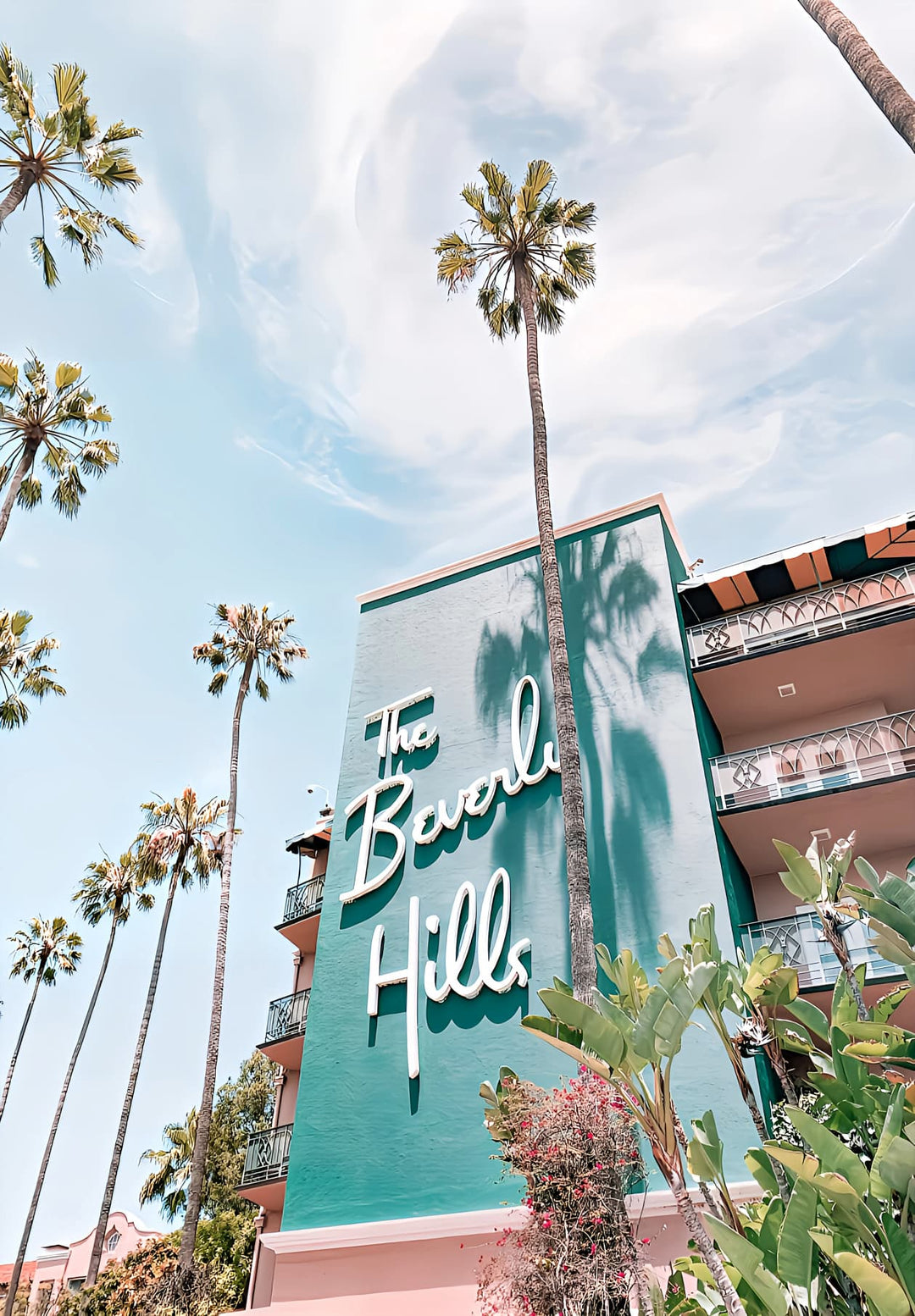 Beverly Hills' hotel facade blends classic elegance with modern appeal. The building represents exquisite hospitality in the center of this historic location, blending luxury and design.
