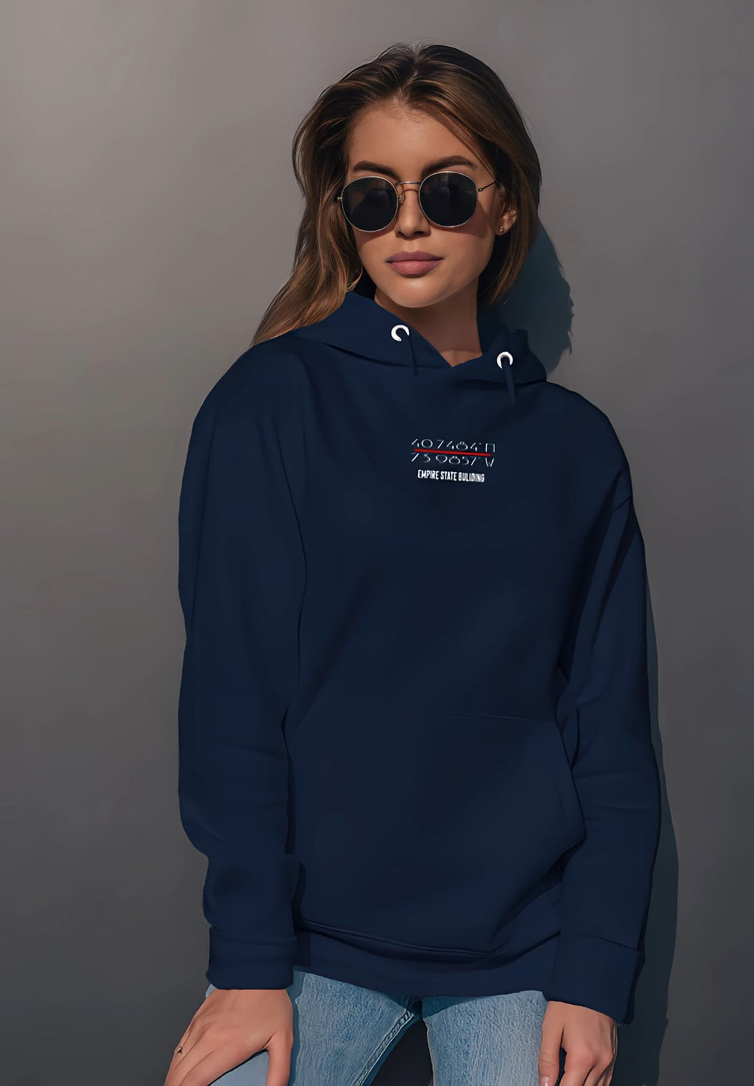 Her relaxed blue sweatshirt and sunglasses style created an urban fashion statement.