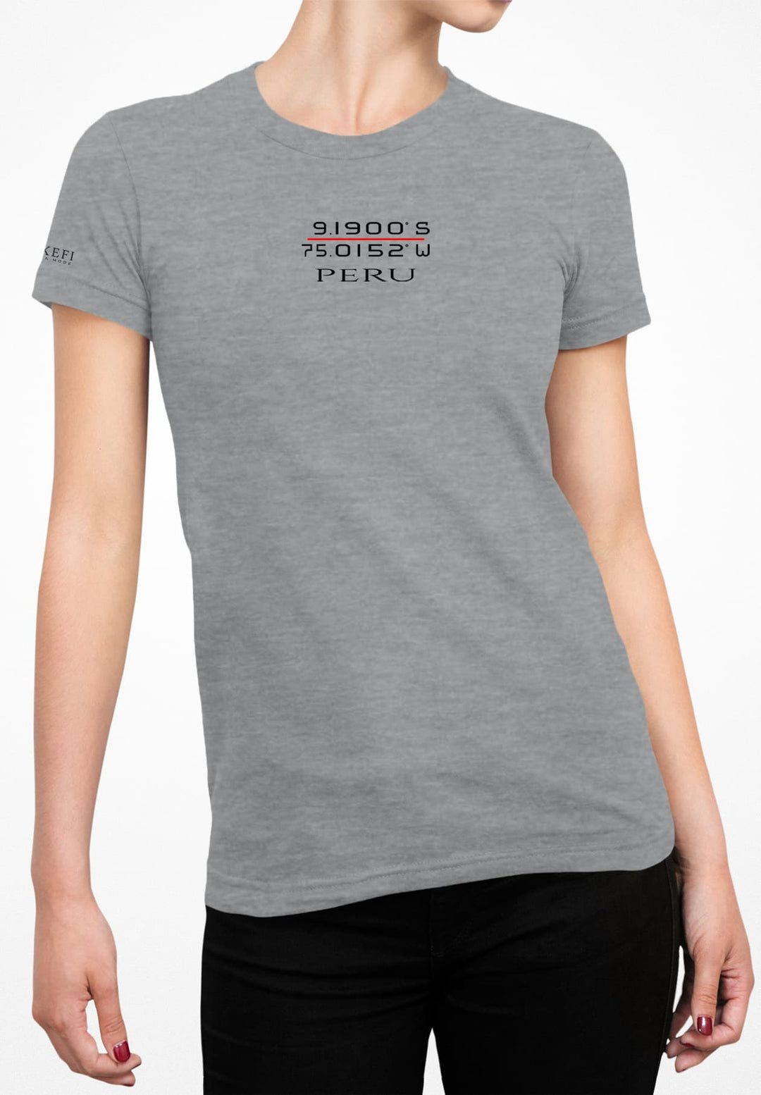  The lady effortlessly combines comfort and style in a gray tee paired with sleek black jeans, embodying timeless elegance.