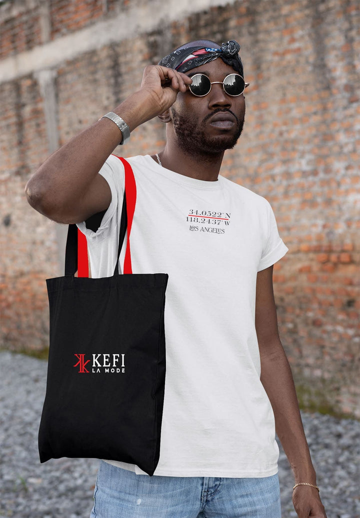 In his white tee and sunglasses, he bears a black tote bag, each step a testament to moments unfolding.