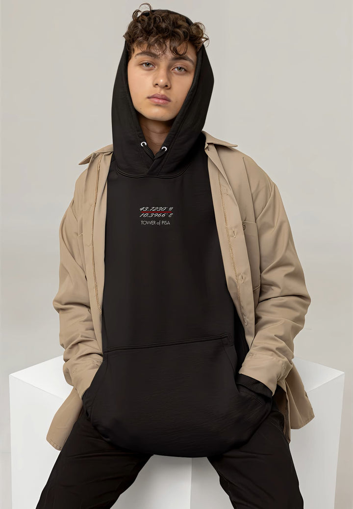The Kefi La Mode black hoodie perfectly blends street-smart with modern fashion, capturing the man's style.