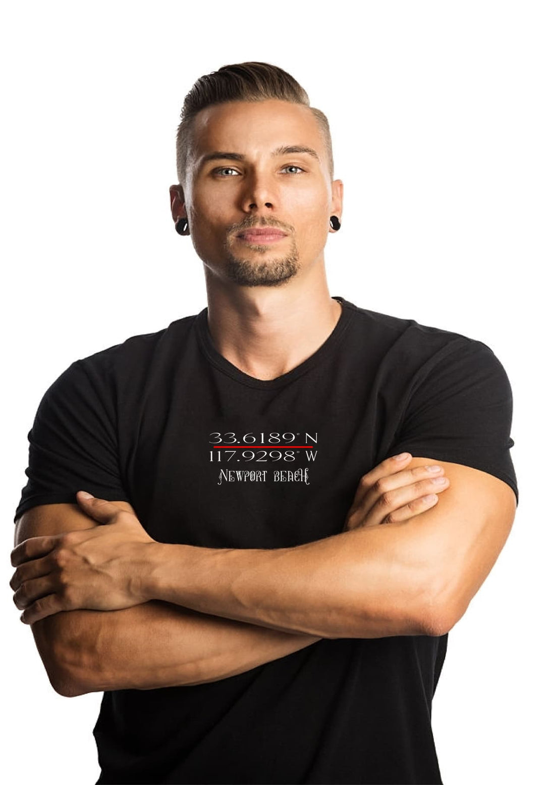 Man in the black Newport Beach tee, arms crossed with coordinates, he embarks on a journey of self-discovery and connection.