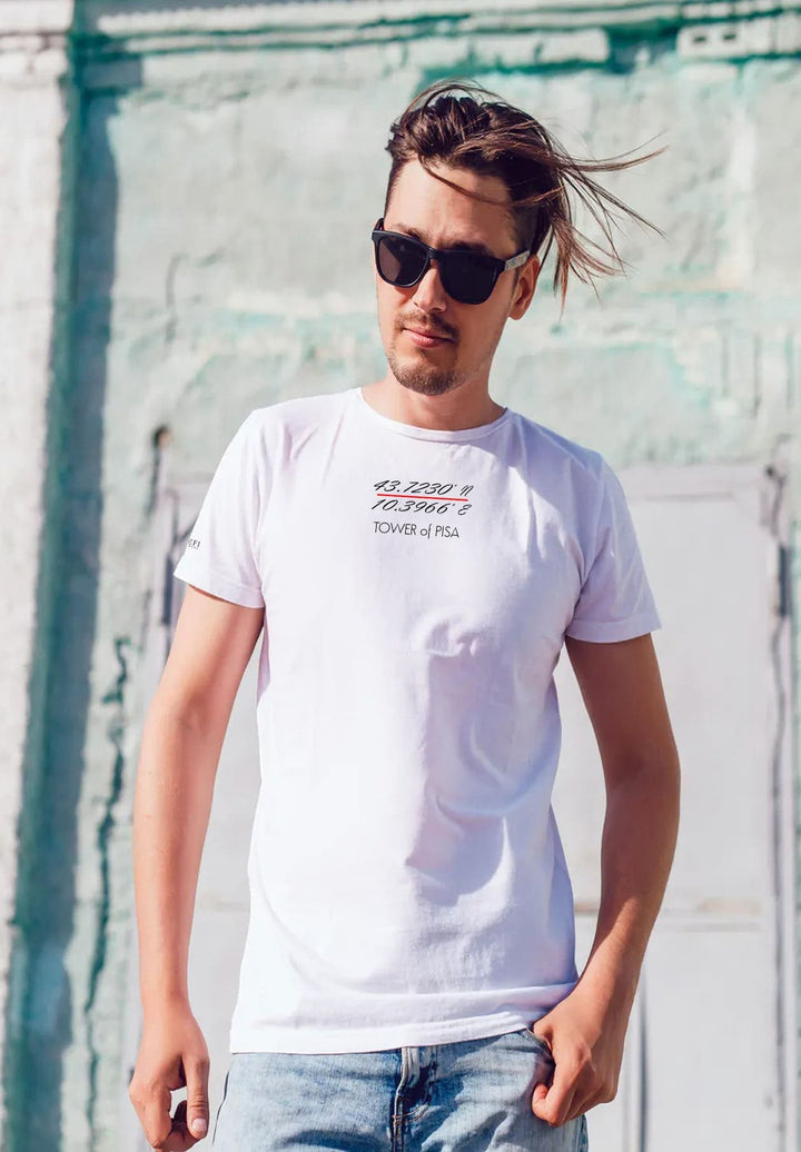 His messy hair tells stories, his white tee a canvas for memories of simple joys and cherished moments shared.