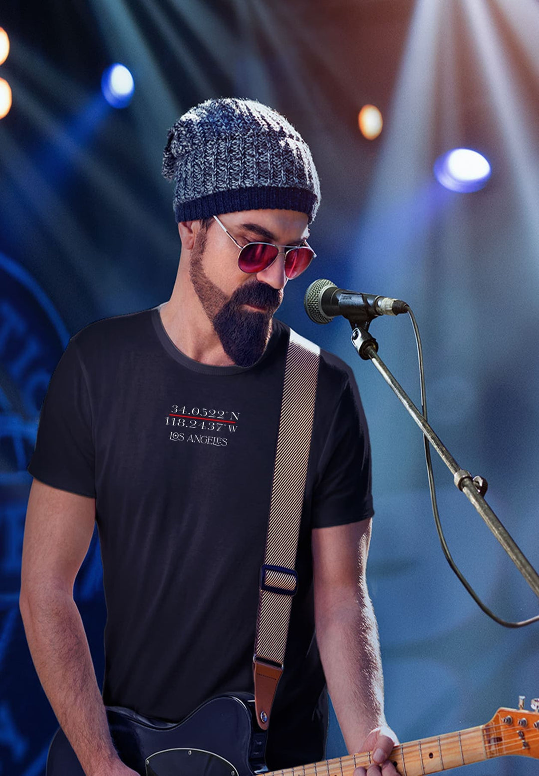 Strumming his guitar in a black tee, he pours his soul into the music, emotions resonating with every chord.