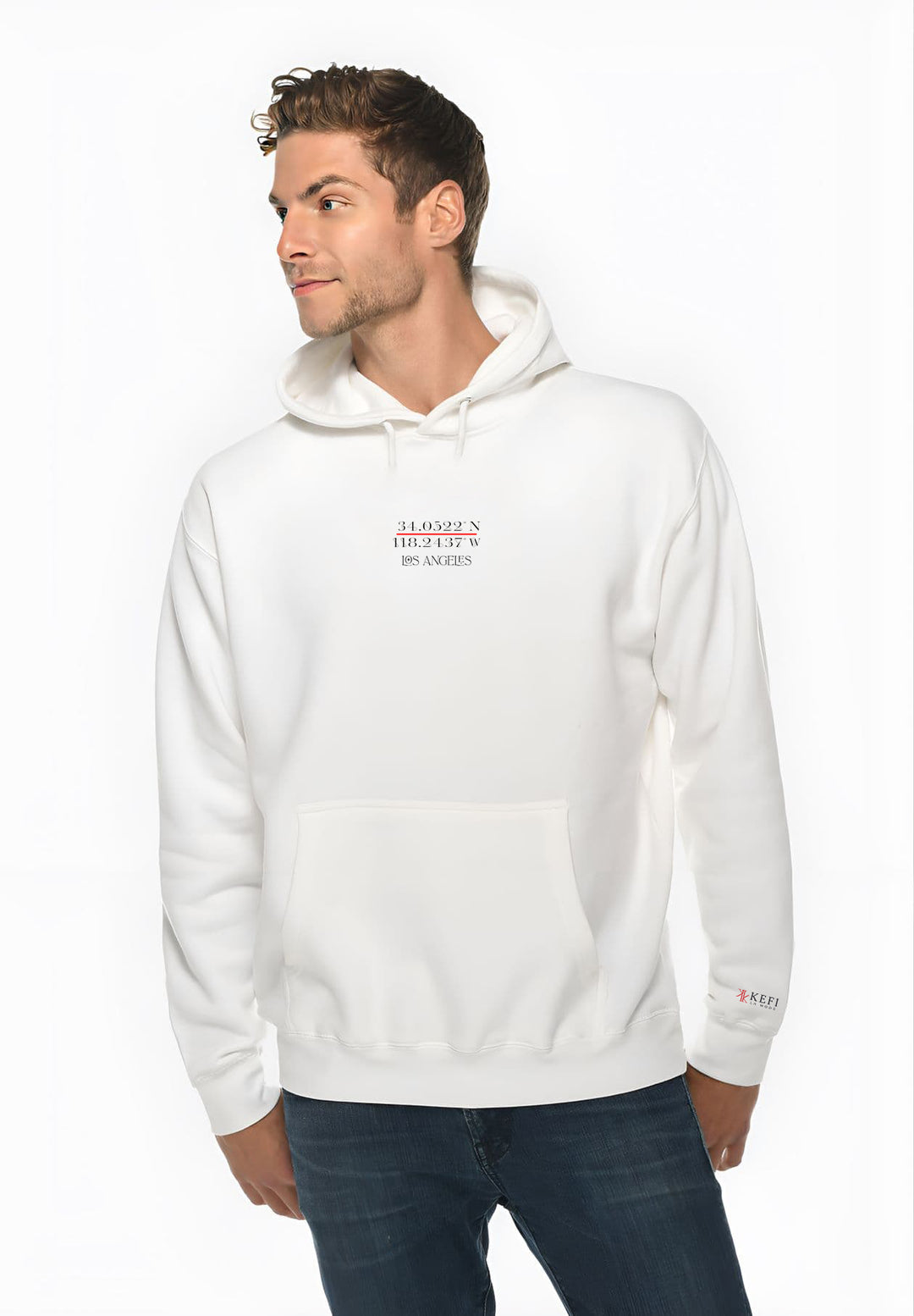 A fashion-forward moment unfolds as the man effortlessly pairs his white hoodie showcasing his distinctive Los Angeles style.