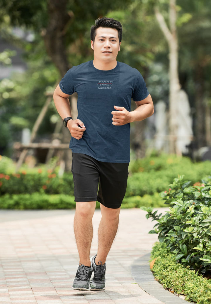 The fabric of his blue activewear tee carries memories of perseverance, each run a celebration of strength and endurance.
