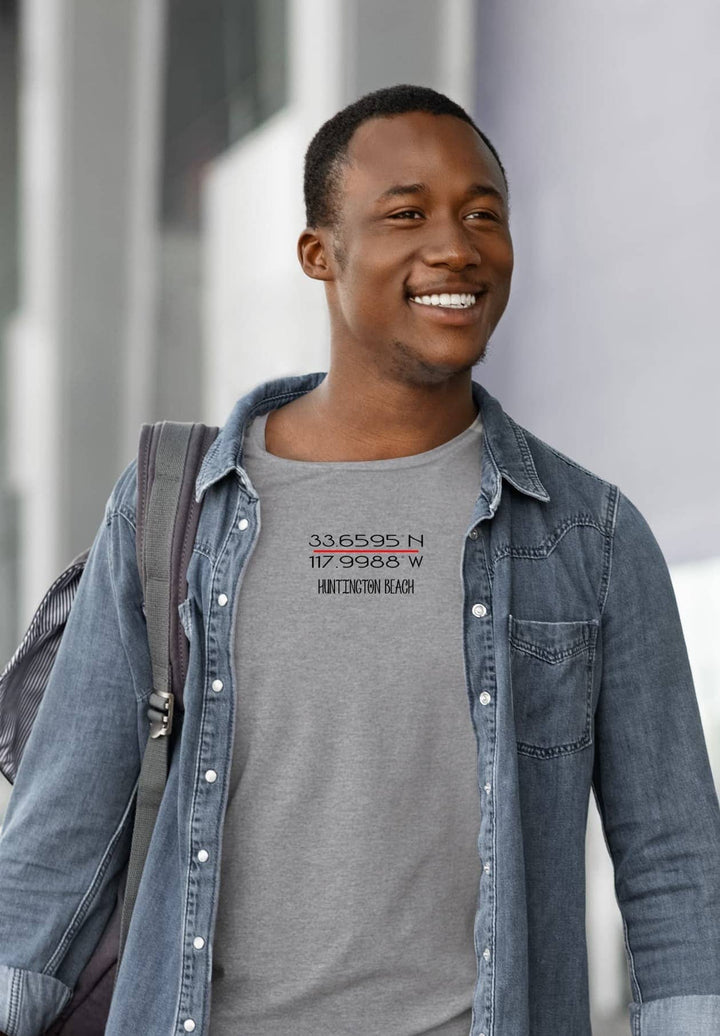 A radiant smile adorns the man in a gray tee, backpack-clad, his journey etched with emotions, laughter, and meaningful moments.