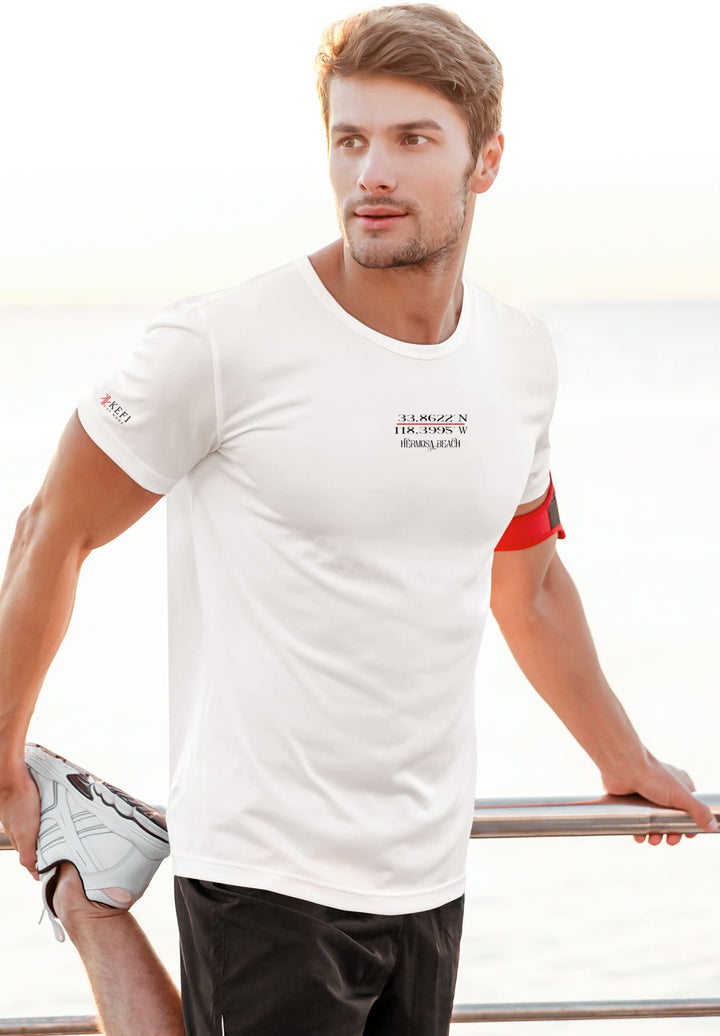 White tee, ocean breeze—the man's presence near the railing unfolds an emotional dialogue with the vast, timeless sea.