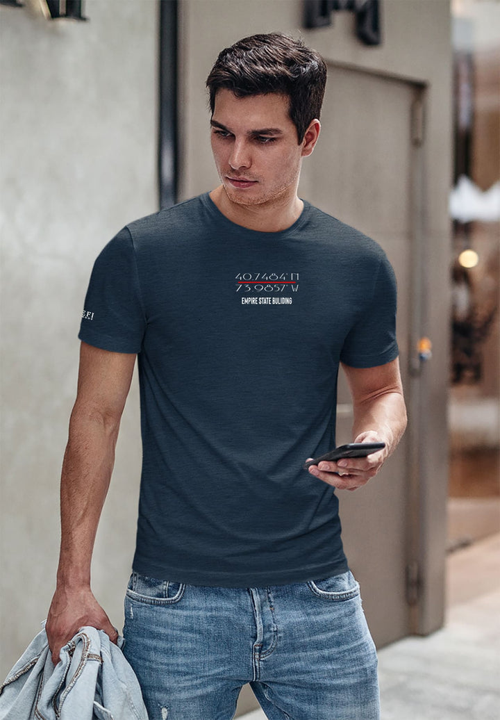 In the blue embrace of his tee, a moment frozen in the emotional hues of connection and reflection.