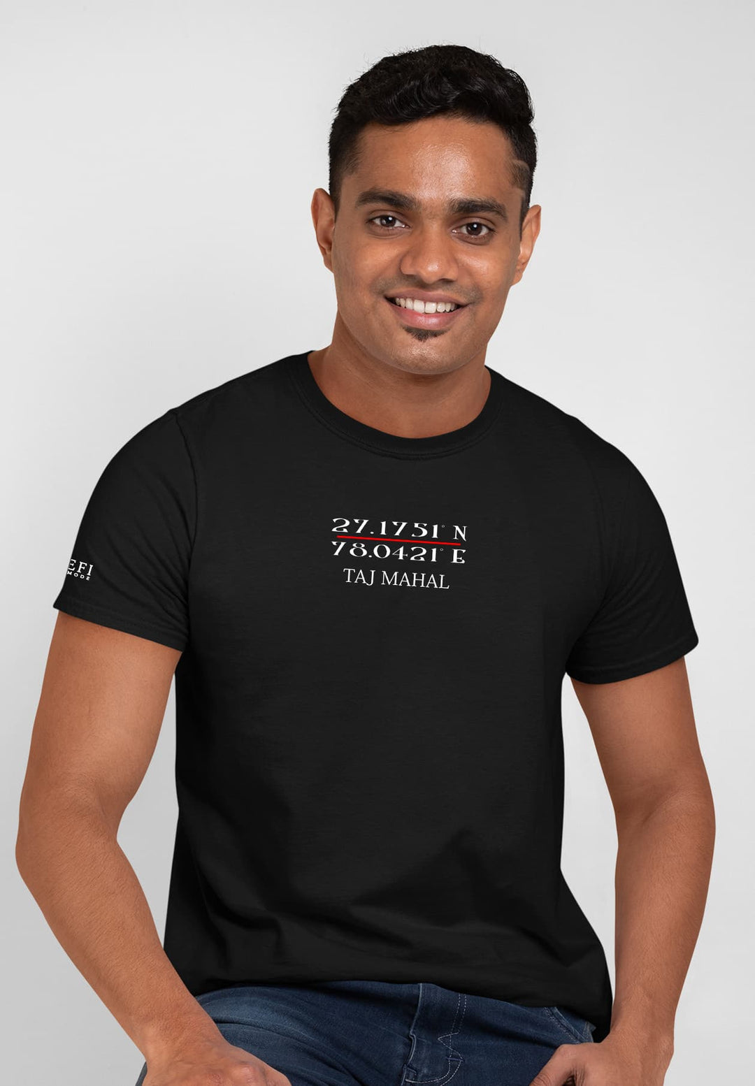 Standing tall, his Taj Mahal black tee embodies history, each thread woven with memories of cultural richness and heritage.