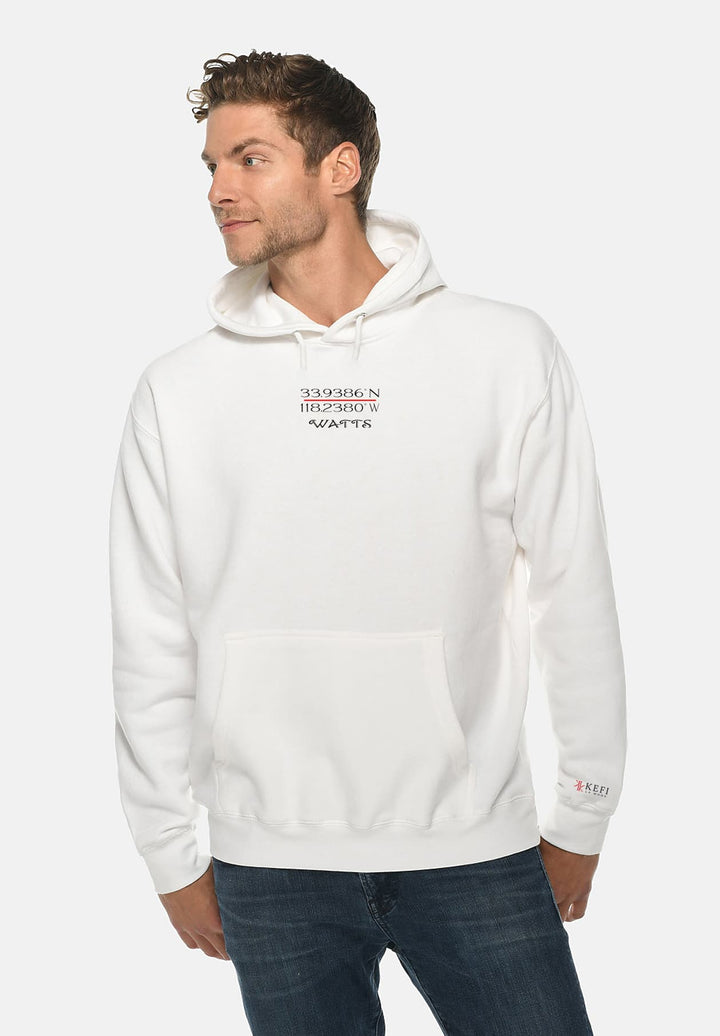 The stylish man's white hoodie reflects his sense of individuality and unity, making a statement that resonates beyond fashion.