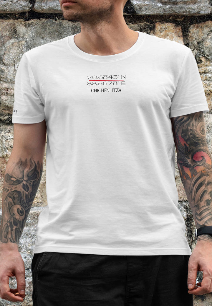 Standing in a white tee, the man's coordinates tell tales, connecting his soul to the ancient whispers.