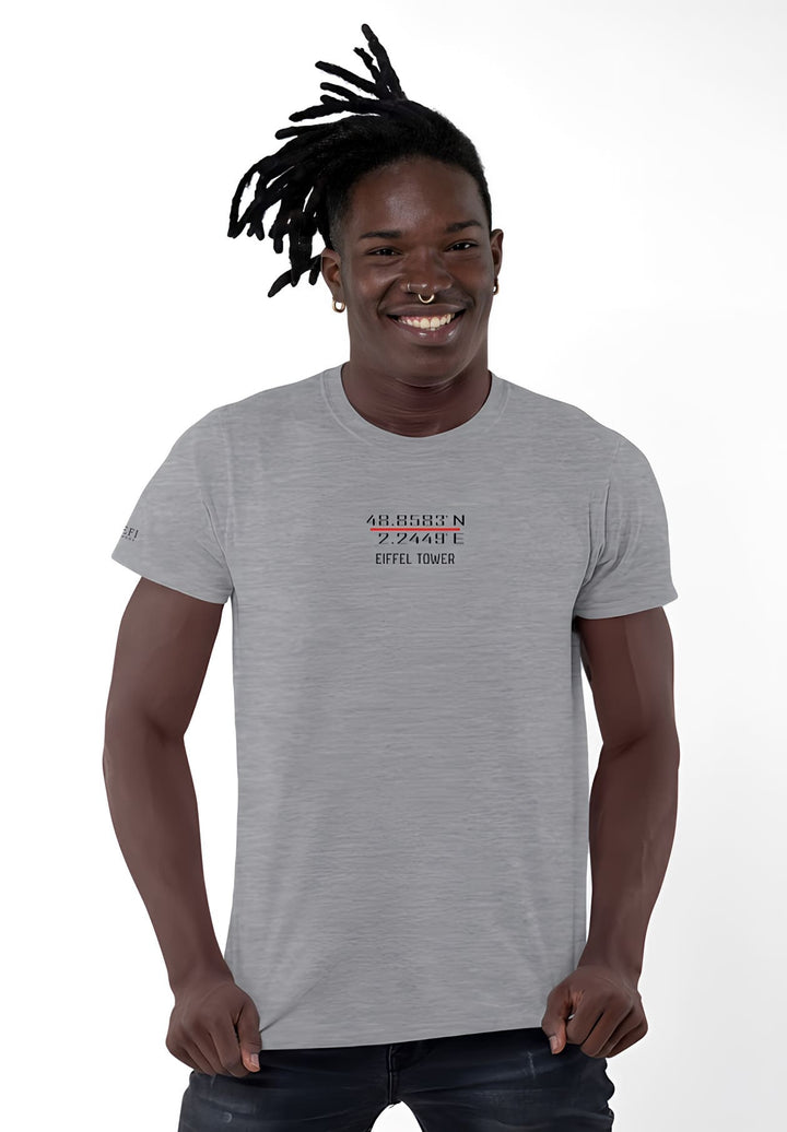     In the simplicity of a gray tee, his soul speaks volumes, an emotional symphony against the silent white backdrop.