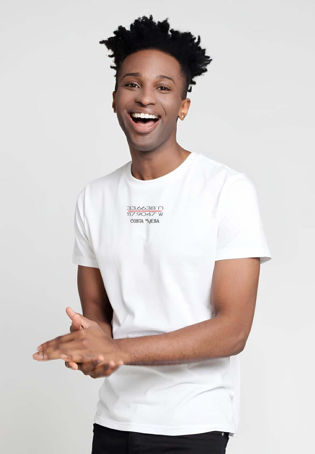 With memories beautifully imprinted on his heart, his white Costa Mesa shirt inspires emotions, while his black pants represent life's contrasts.