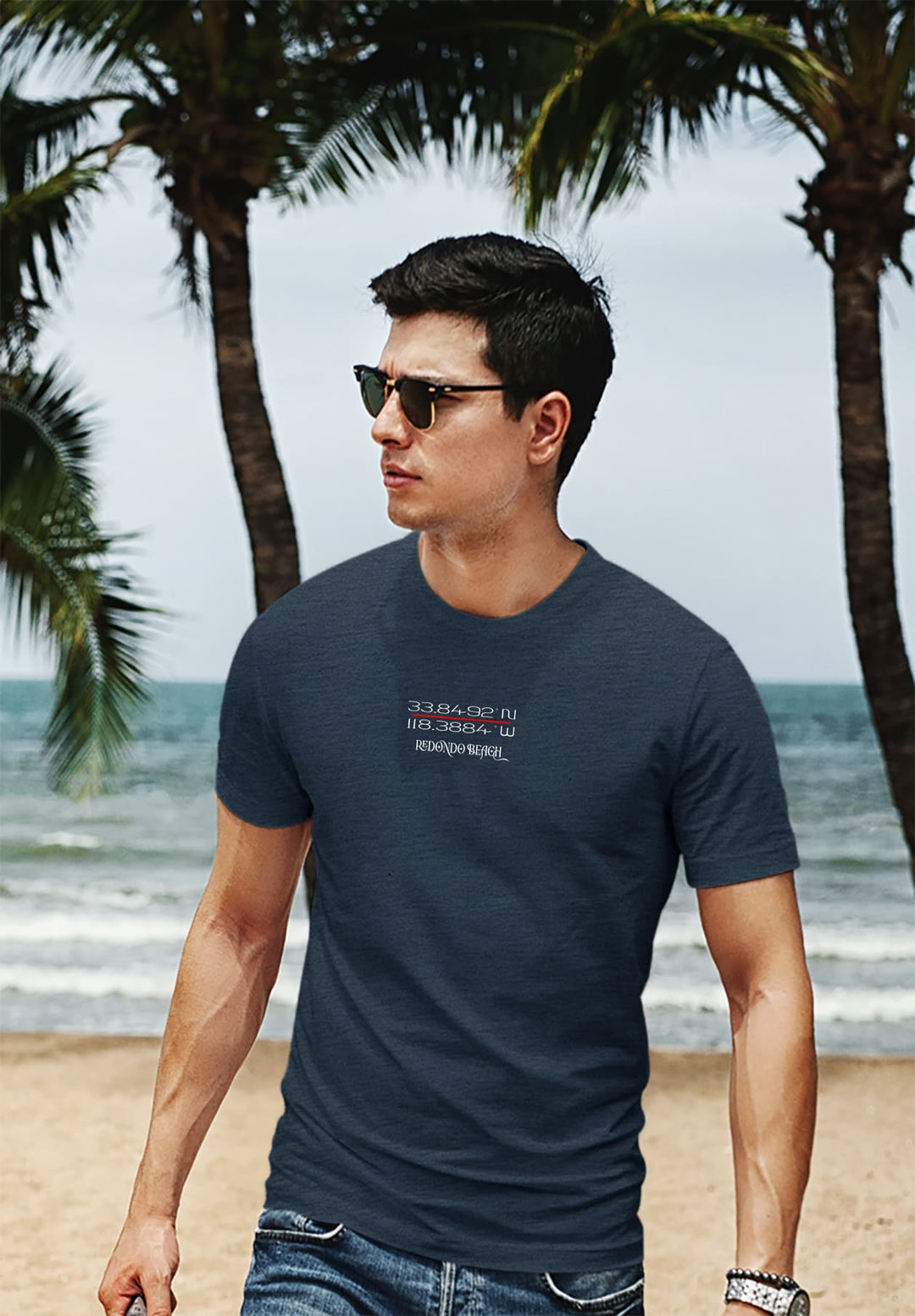 In his blue Redondo Beach t-shirt, he finds comfort, a tangible connection to cherished moments and the endless expanse of the sea.