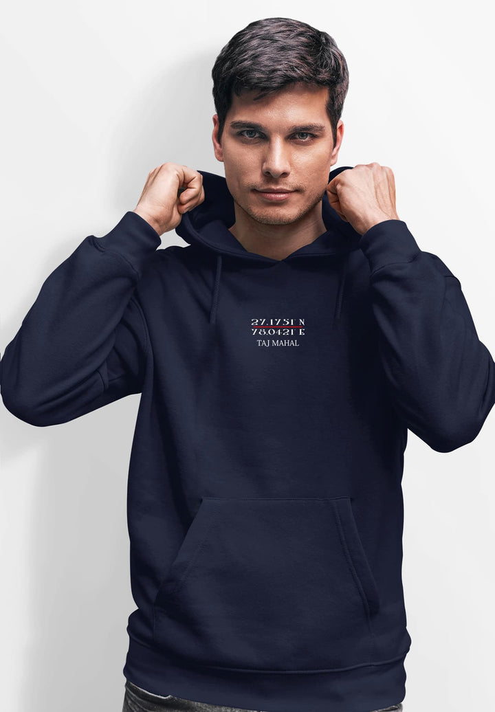 A symphony of aesthetics and confidence, the man's pose brings out the charisma of his blue Taj Mahal pullover hoodie, a statement in itself.