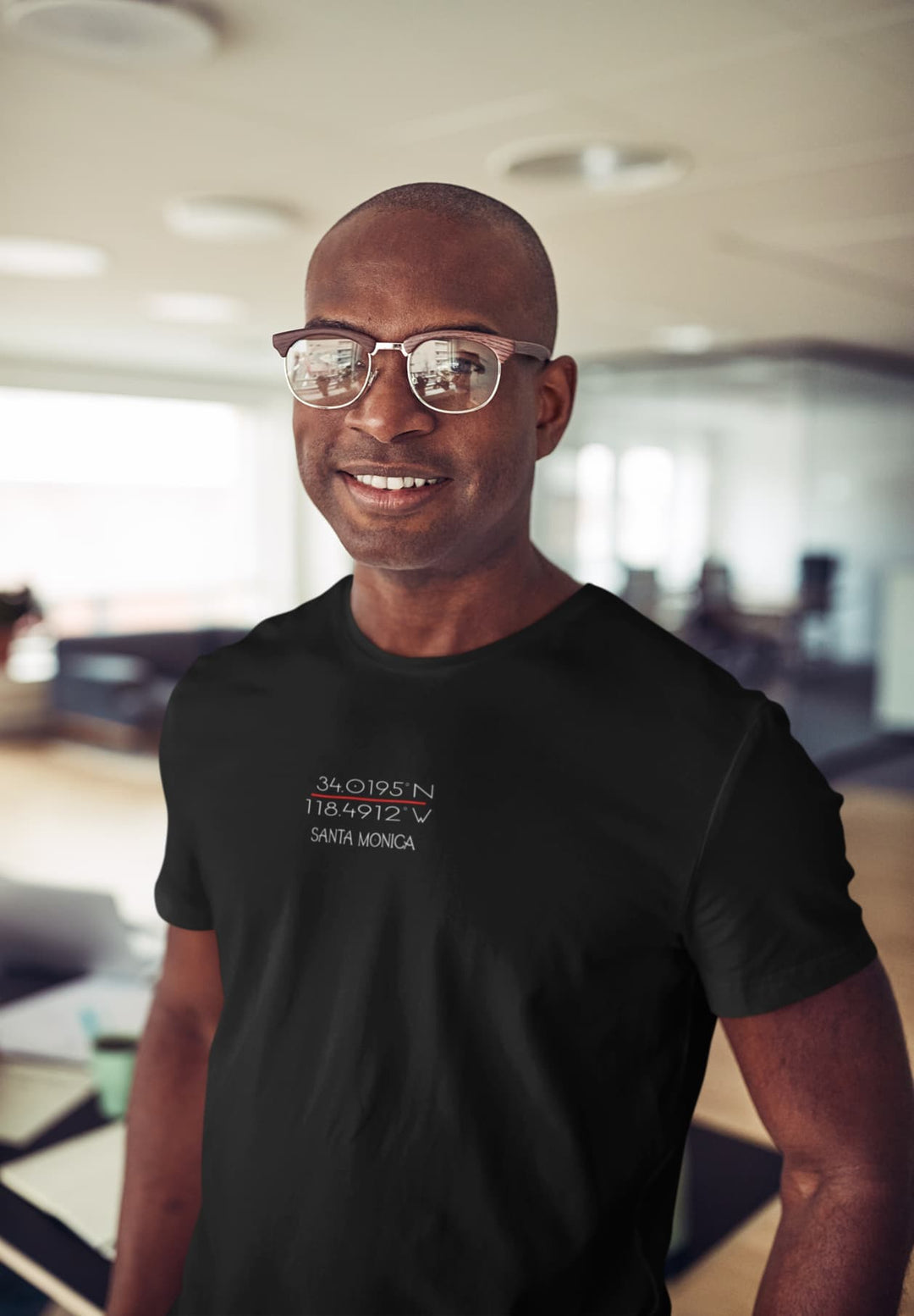 At the office, his black tee and glasses exude confidence, each task a moment of focus, memories of achievement.