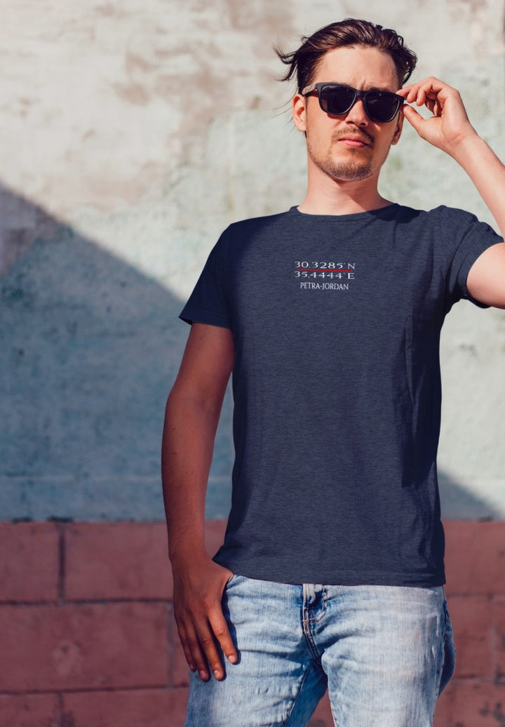 In his blue tee and shades, he journeys through time, tracing the echoes of history with every step forward.