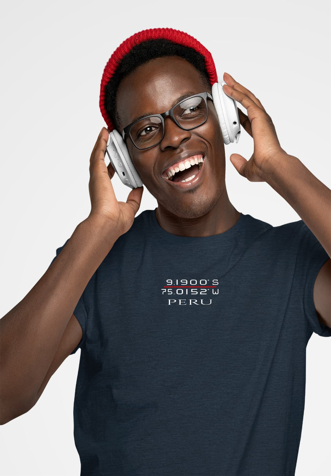 In his blue tee, he immerses in music, his red hat a beacon of passion, glasses reflecting his soul's symphony.
