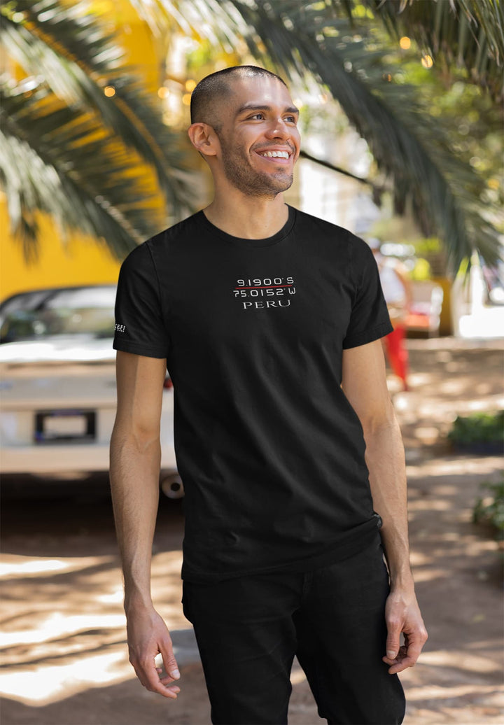 In the soft light of spring, his black tee whispers stories of resilience, echoing the growth within his soul.