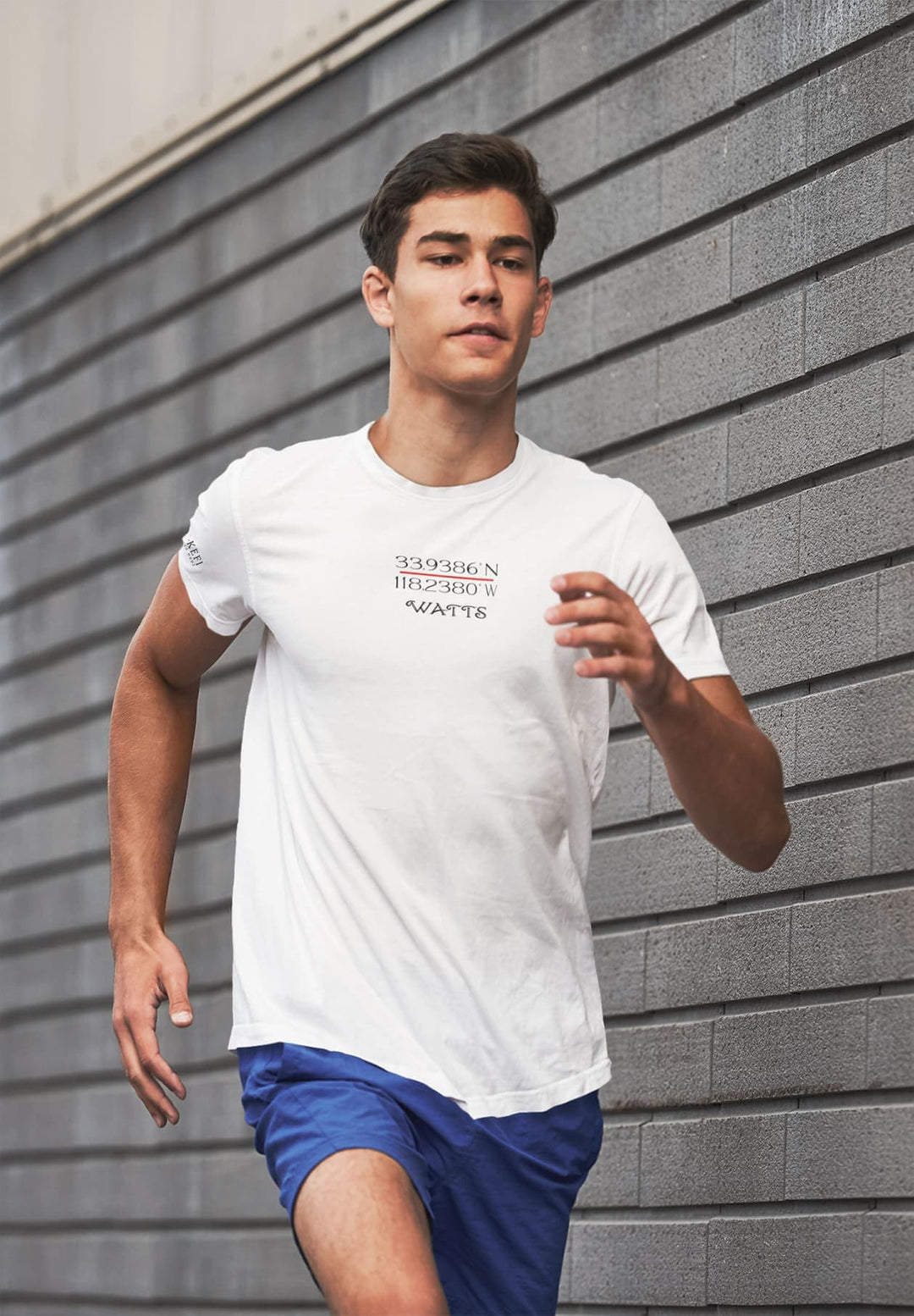 With each step, his white tee symbolizes moments of vitality and endurance, memories of the journey imprinted within.