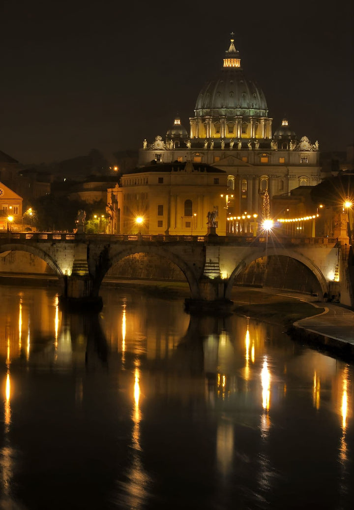 In the nocturnal aura, Saint Peter's Basilica in Vatican City resonates—a majestic silhouette, a beacon of spiritual and emotional reverence.