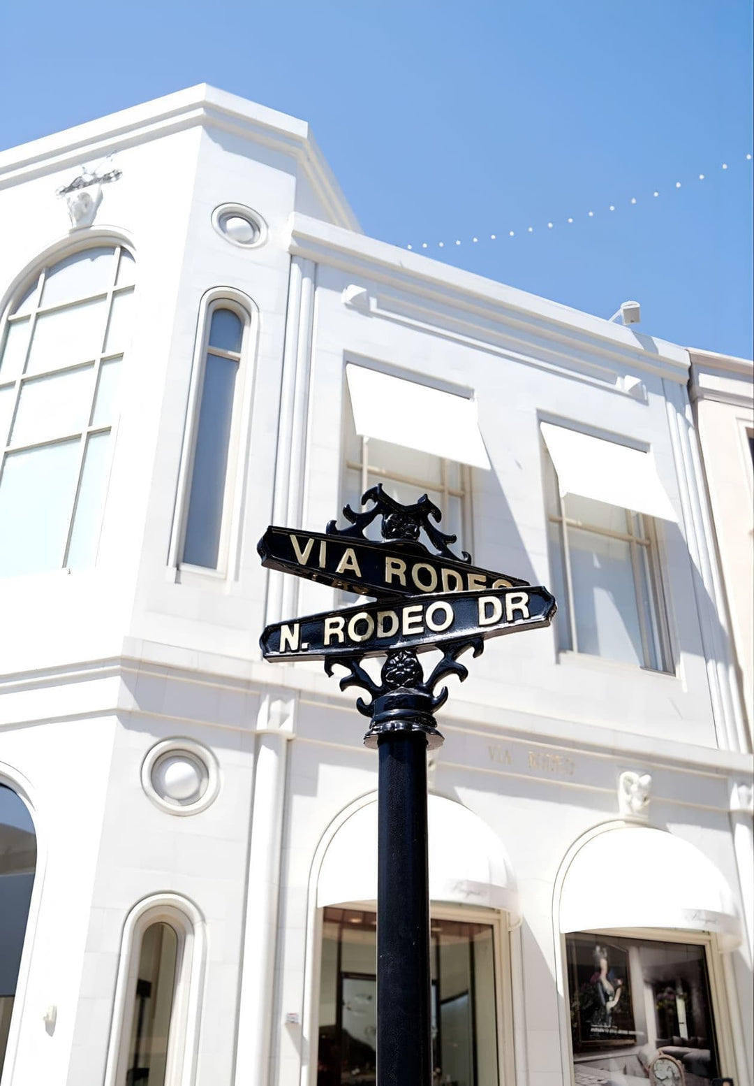 The location specified is a street sign located on N. Rodeo Drive in Beverly Hills, Los Angeles, California.