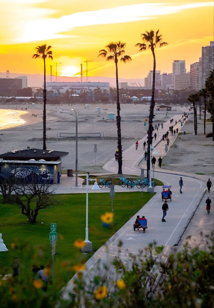 Every pedal stroke shouts freedom and warms the sky on a sunset bike ride down Long Beach's lovely coast, engulfing the soul in nature's twilight embrace.