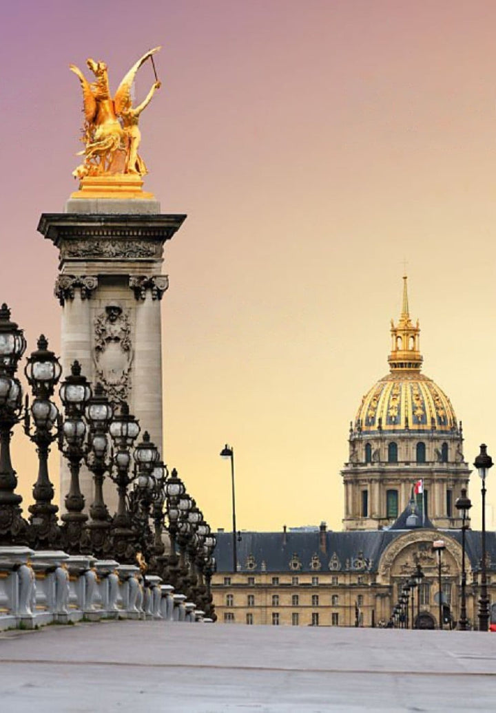 The Alexander III Bridge, located in the center of Paris, exudes a timeless beauty that perfectly complements the majestic Hotel des Invalides.