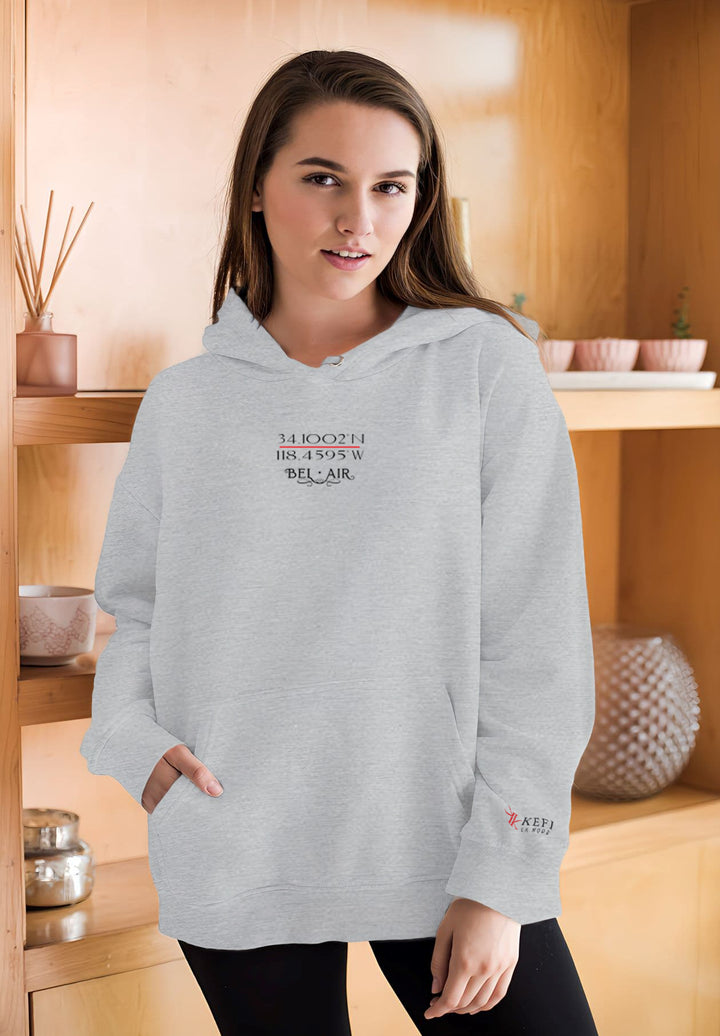 The woman in her gray hoodie and black bottoms becomes an instant fashion sensation, a moment captured by the effortlessly chic ensemble.