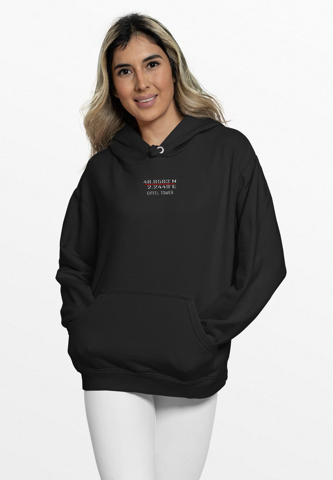 Wrapped in the comfort of a black hoodie embellished with the Eiffel Tower GPS coordinates, the young woman radiated an understated elegance that captured the essence of Parisian style.