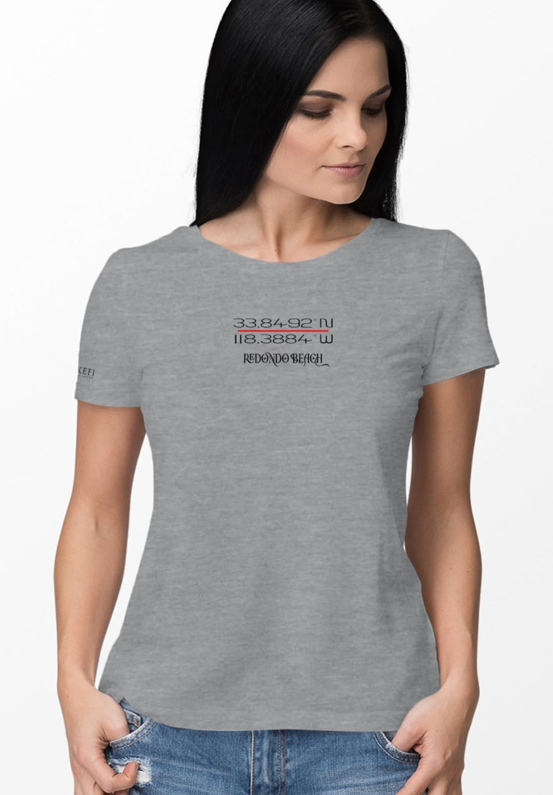 A gray T-shirt fits her silhouette in the soft sway of her steps, a carefree grace creating the picture of calm.